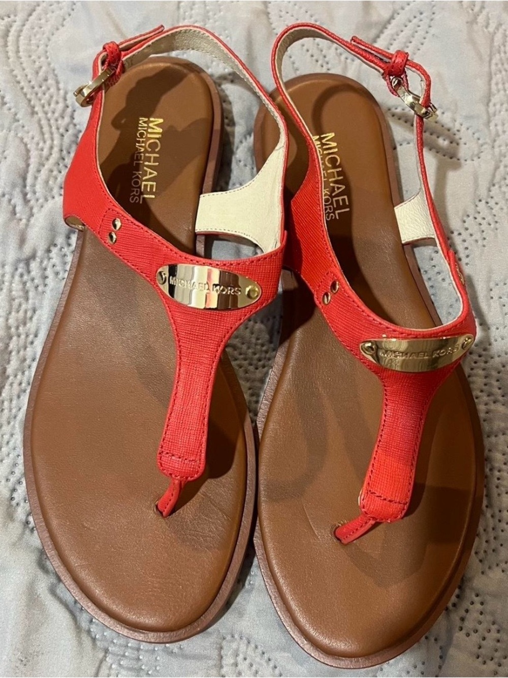MICHAEL Michael Kors Coral and Cream T-Strap Sandals with Gold Plaque